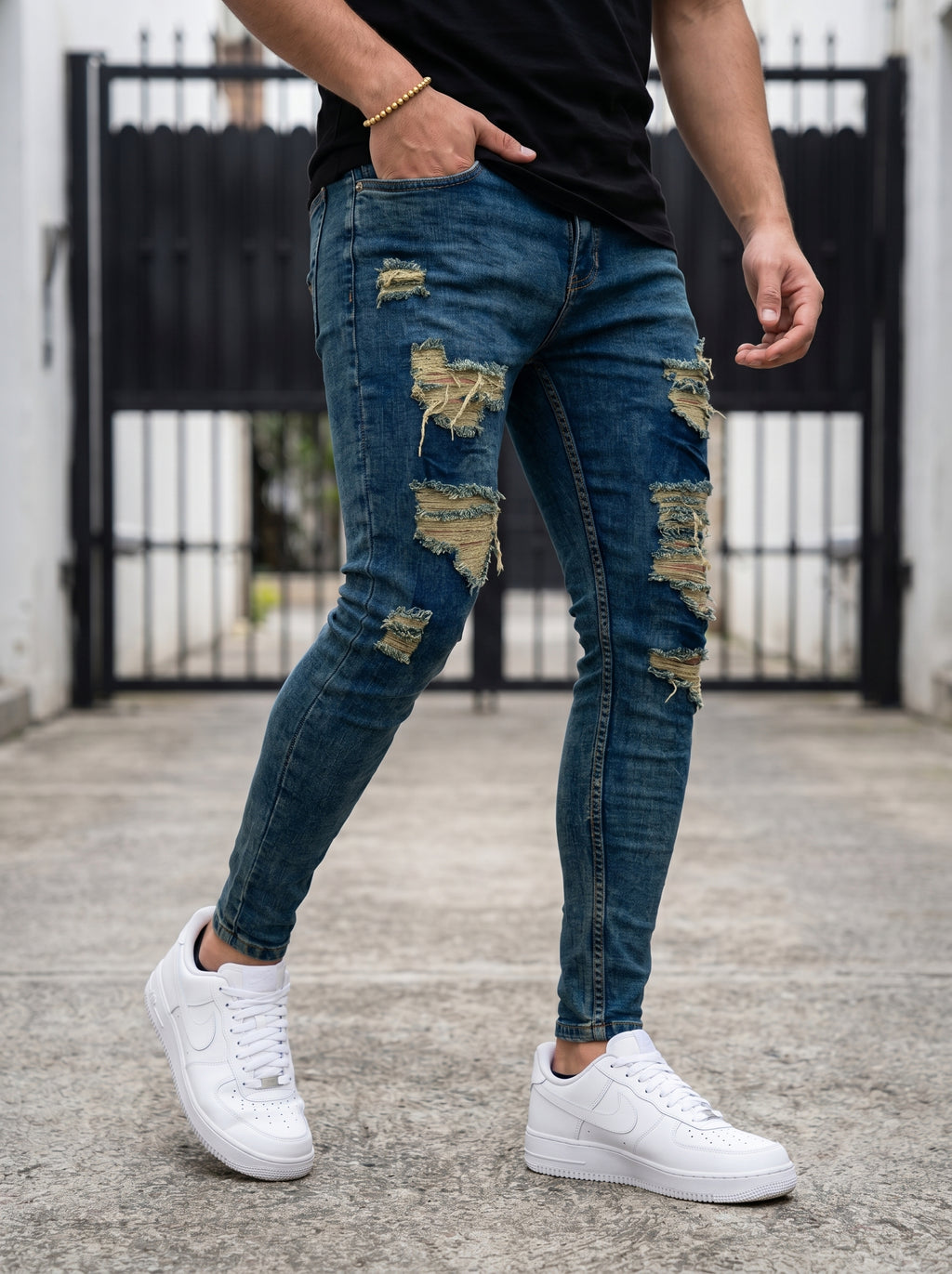 JEAN SKINNY - VERDE TODO ROTO