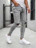 JEAN SKINNY - GRIS CLARO ROTO