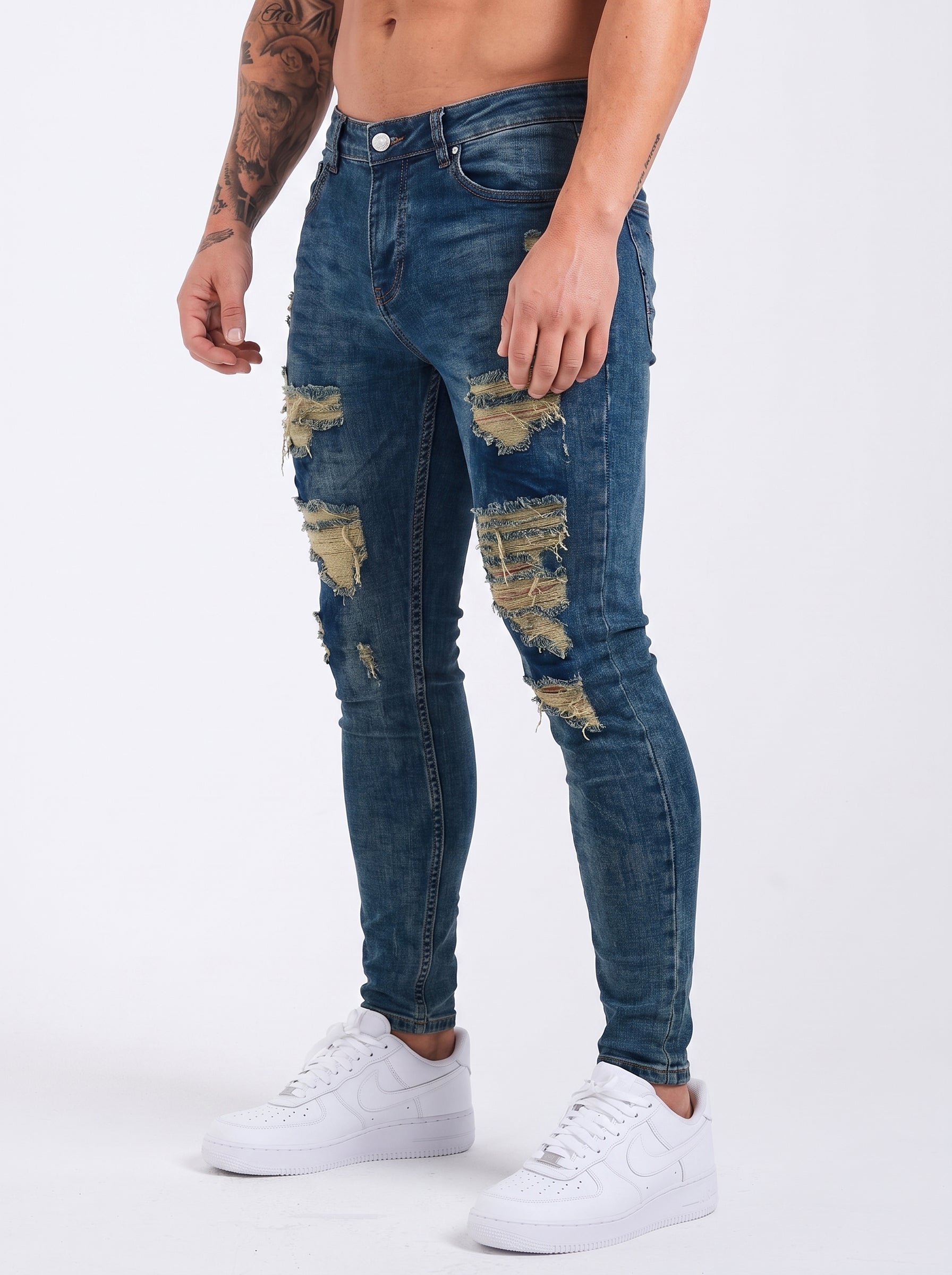JEAN SKINNY - VERDE TODO ROTO