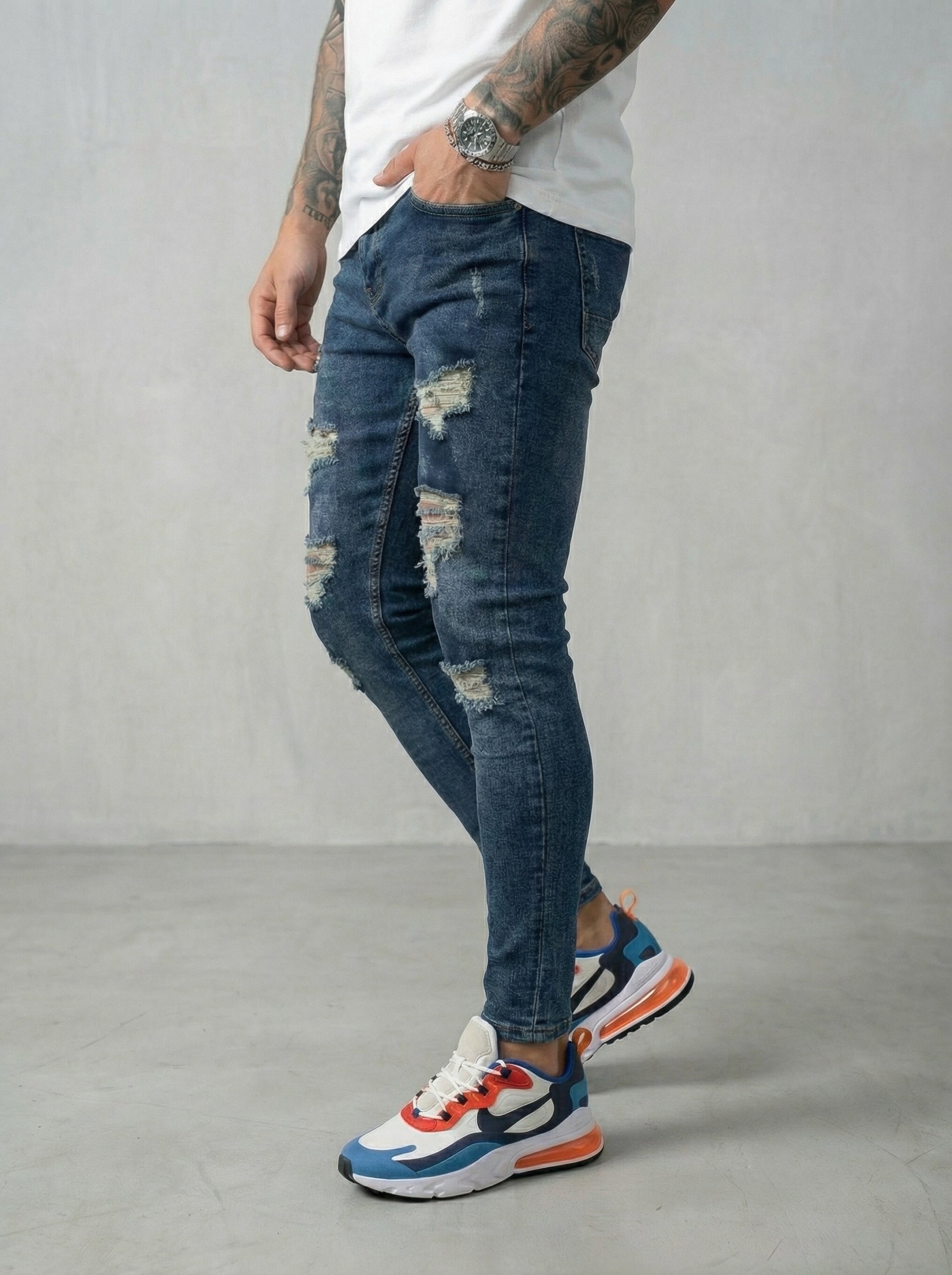 JEAN SKINNY - VERDE TODO ROTO