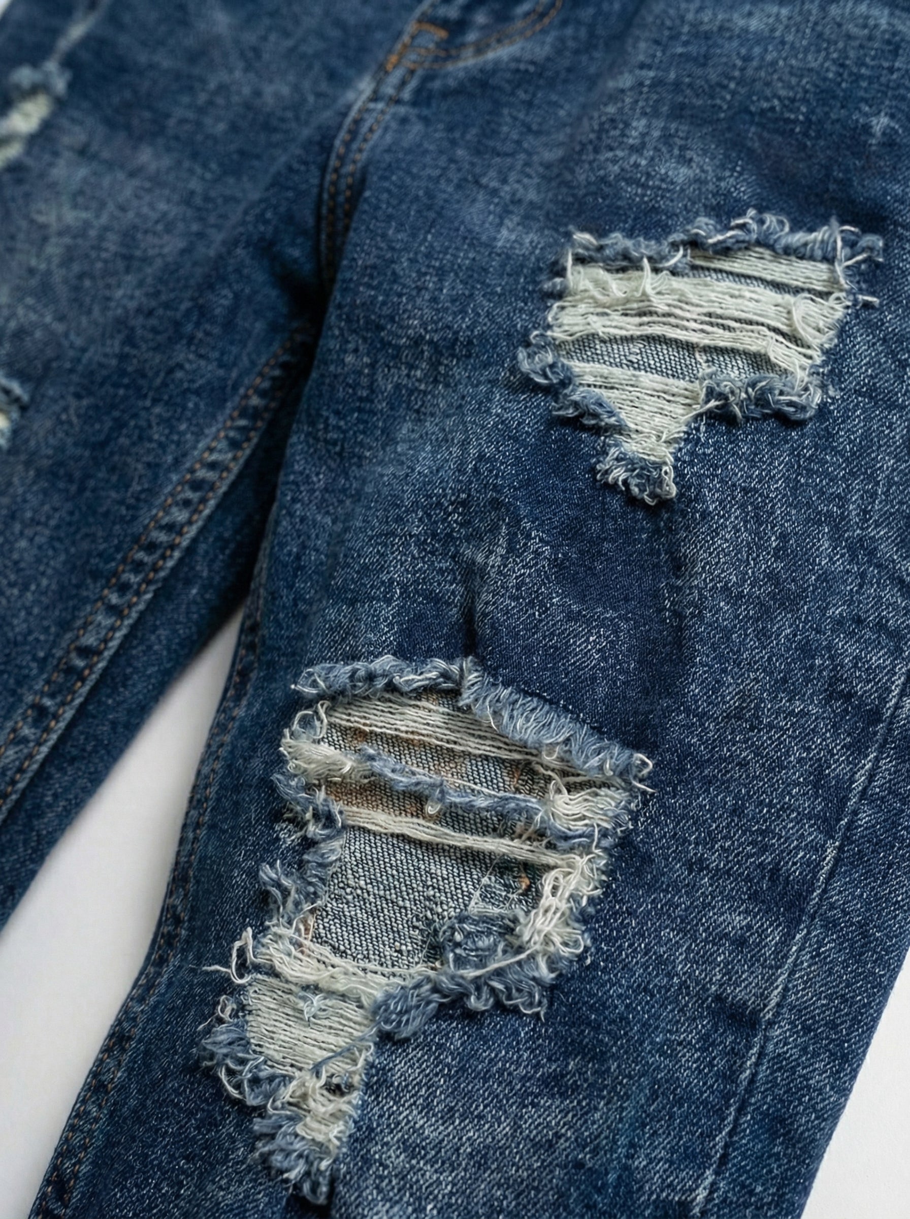 JEAN SKINNY - VERDE TODO ROTO
